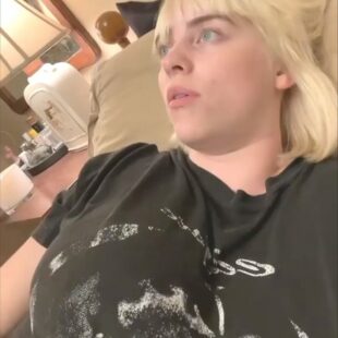 Billie Eilish shakes her big boobs sexy photo