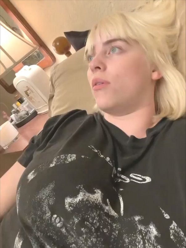 Billie Eilish shakes her big boobs sexy photo